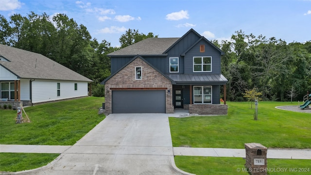 craftsman-style home featuring a front yard and a garage