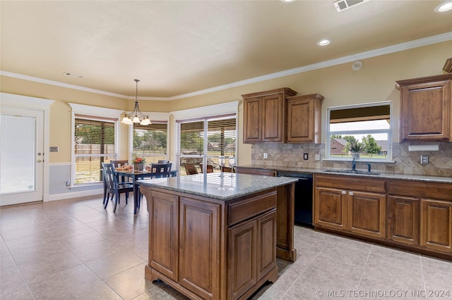 kitchen with light tile patterned floors, a sink, visible vents, an inviting chandelier, and dishwasher