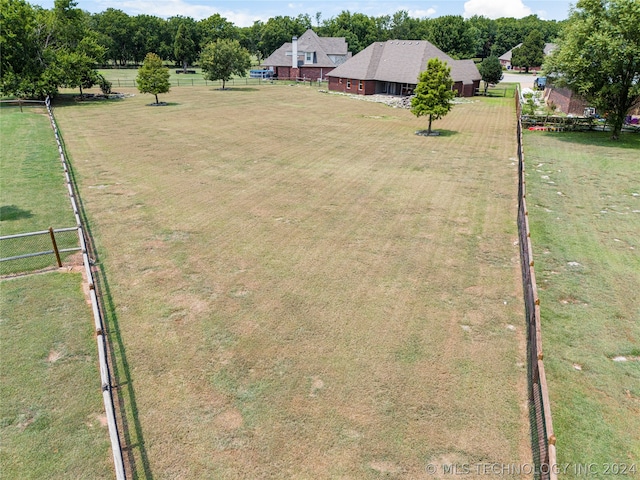 view of yard with a rural view