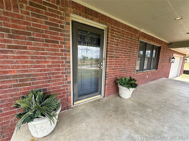 entrance to property with a porch