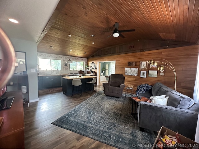 living room featuring wooden ceiling, ceiling fan with notable chandelier, lofted ceiling, and dark wood-type flooring