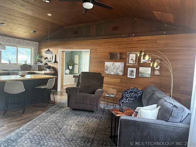 living room featuring wood ceiling, wood walls, ceiling fan, and dark hardwood / wood-style floors