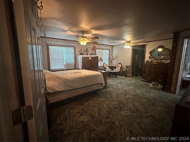 carpeted bedroom featuring ceiling fan