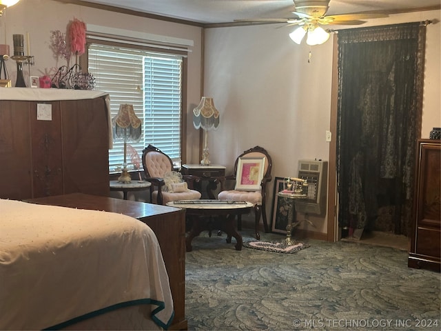 bedroom with ceiling fan and ornamental molding