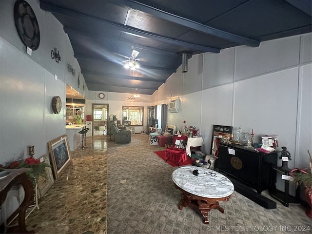 interior space featuring high vaulted ceiling, carpet, and ceiling fan