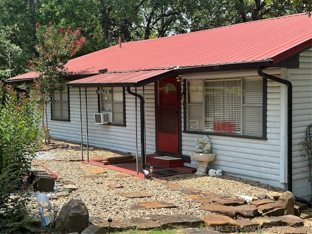 view of front facade featuring cooling unit