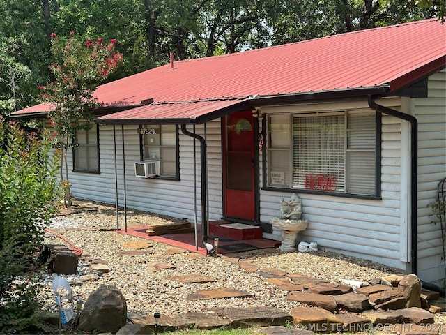 view of front of home with cooling unit