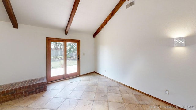 unfurnished room featuring visible vents, lofted ceiling with beams, and baseboards