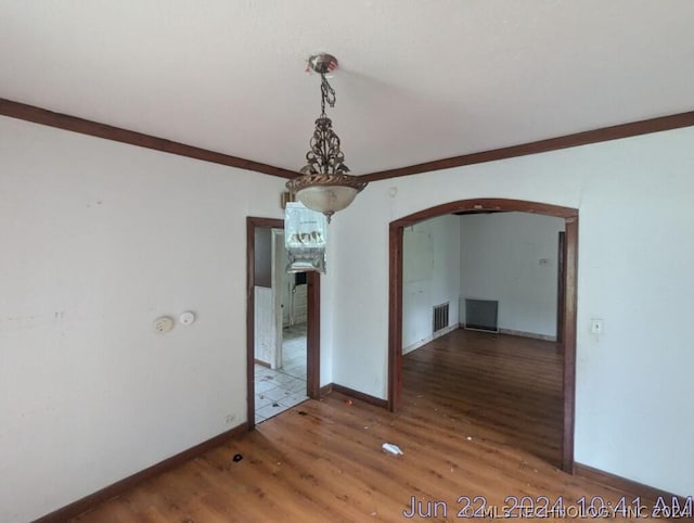 empty room featuring hardwood / wood-style flooring