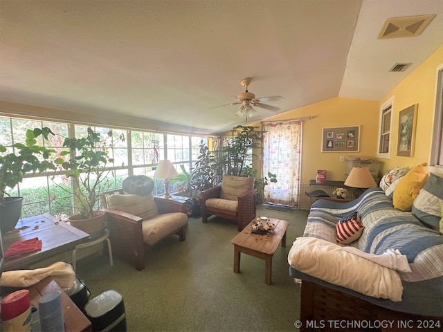 living room featuring ceiling fan and vaulted ceiling