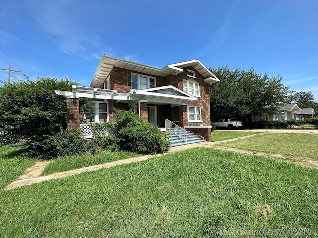 view of front of property featuring a front lawn