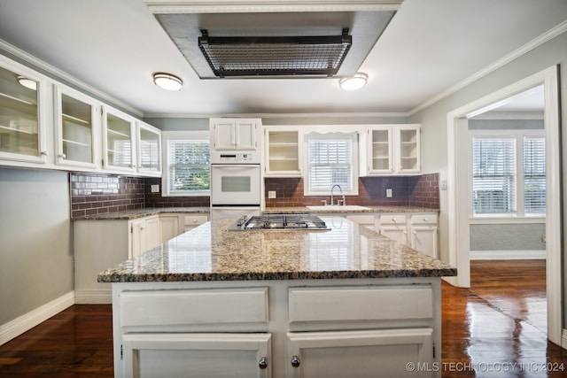 kitchen with a wealth of natural light and a center island