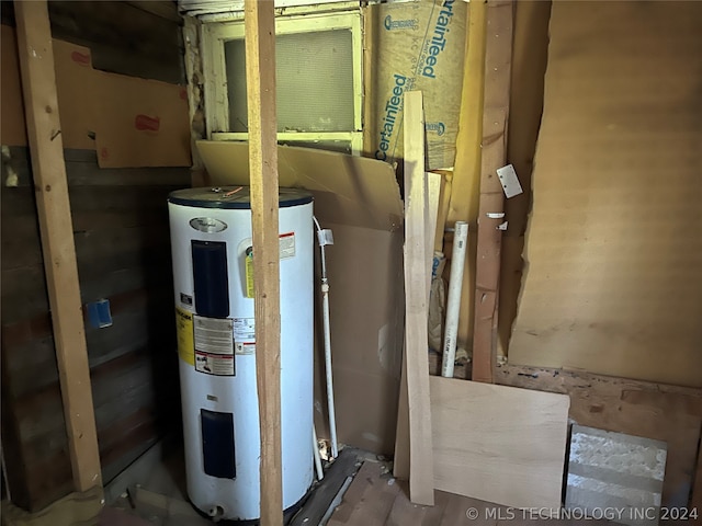 utility room featuring water heater