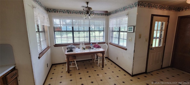 dining area with ceiling fan