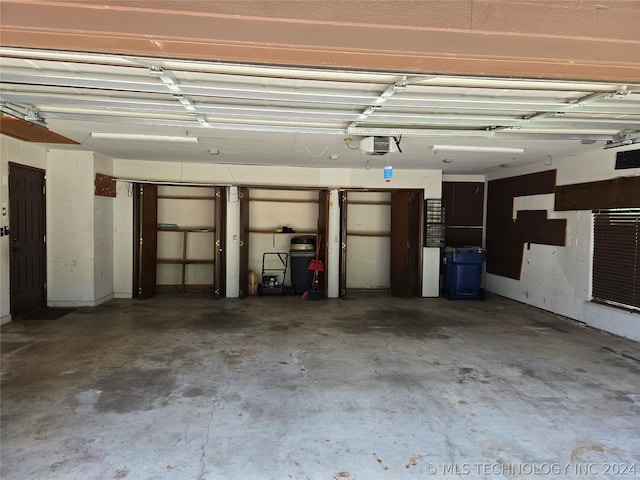 garage featuring a garage door opener