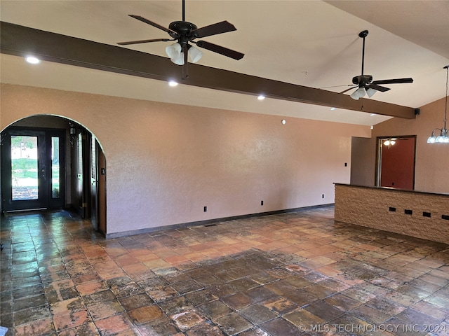 tiled empty room with lofted ceiling with beams and ceiling fan