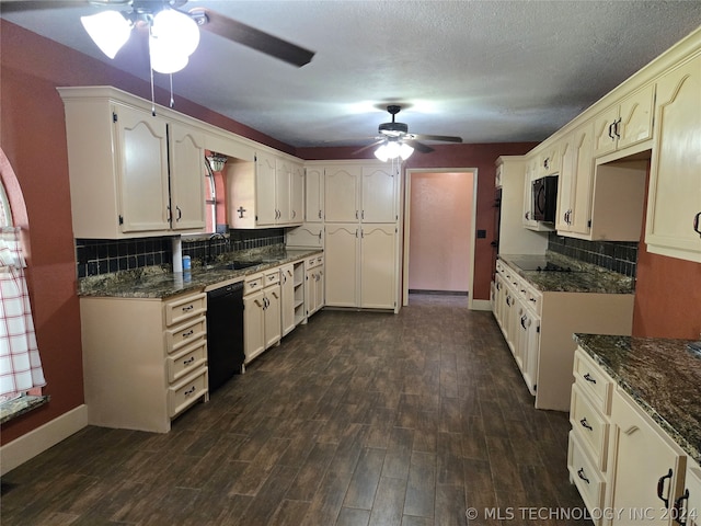 kitchen with black dishwasher, dark stone counters, backsplash, dark hardwood / wood-style floors, and ceiling fan