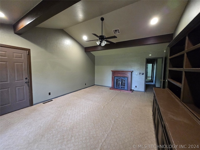 unfurnished living room featuring vaulted ceiling with beams, ceiling fan, and light colored carpet