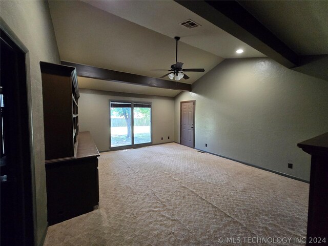 carpeted cinema room with vaulted ceiling with beams and ceiling fan