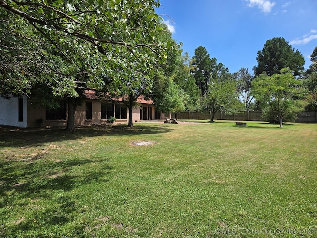 view of yard with fence