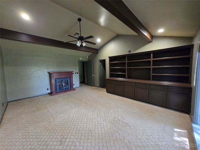 unfurnished living room featuring lofted ceiling with beams, light carpet, and ceiling fan