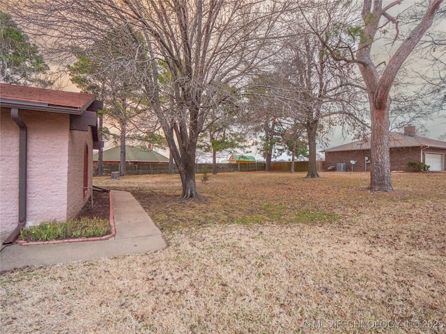 view of yard featuring fence