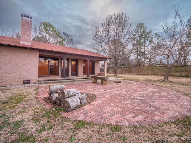 view of patio / terrace with fence