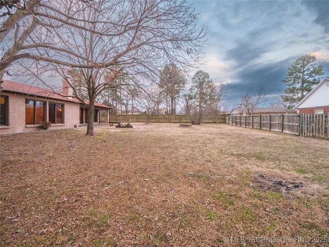 view of yard featuring a fenced backyard