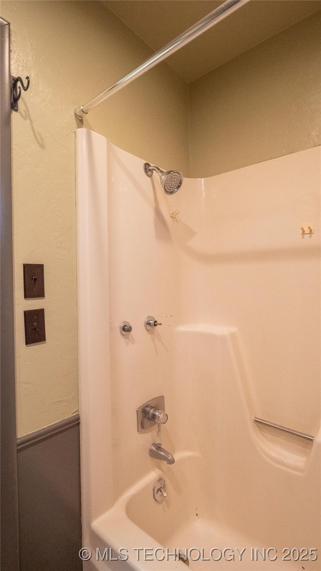 bathroom featuring tub / shower combination