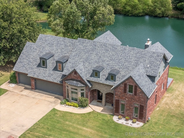 view of front of house featuring a water view and a front yard