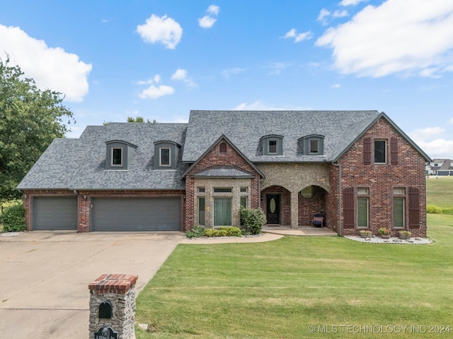 french country inspired facade with a front yard