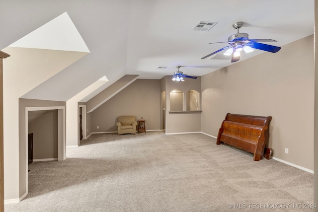 bonus room featuring light carpet, lofted ceiling, and ceiling fan