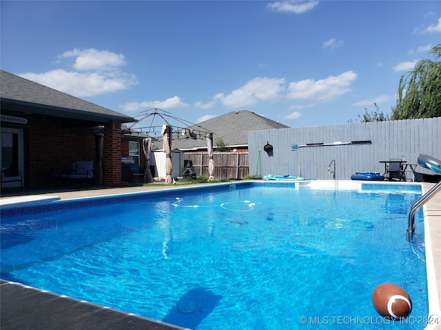 view of pool with a gazebo