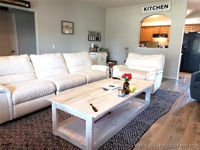 living area featuring wood finished floors