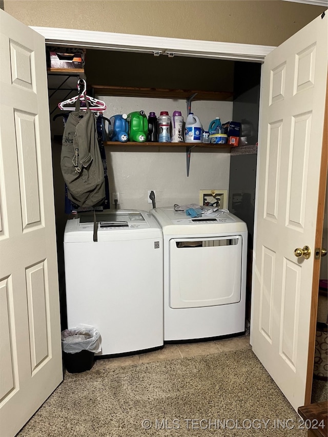 washroom featuring independent washer and dryer