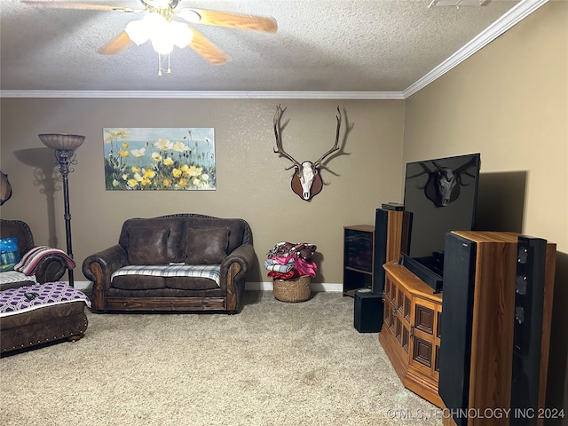 living room with crown molding, carpet, ceiling fan, and a textured ceiling