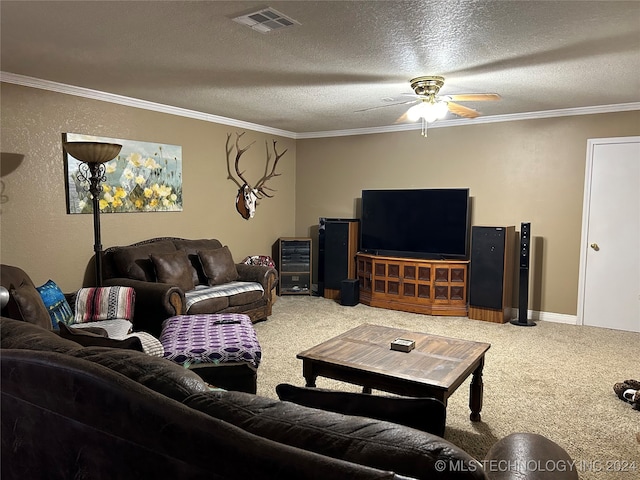 carpeted living room featuring a textured ceiling, ornamental molding, and ceiling fan