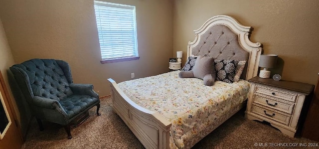 bedroom featuring carpet