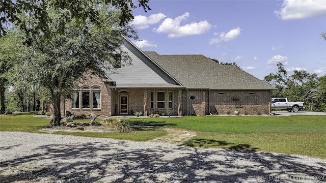 view of front of home with a front yard