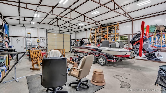 garage with a workshop area