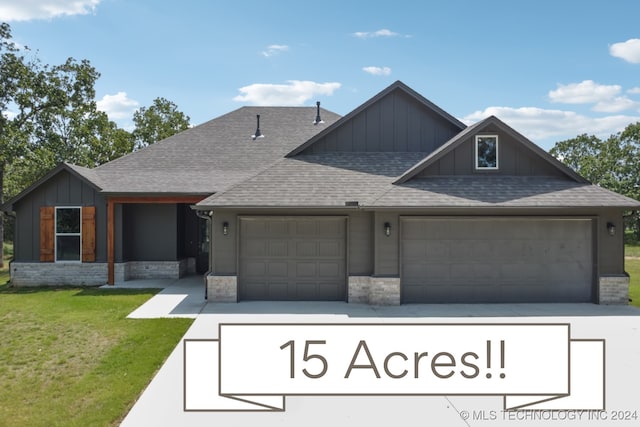 view of front facade with a front lawn and a garage