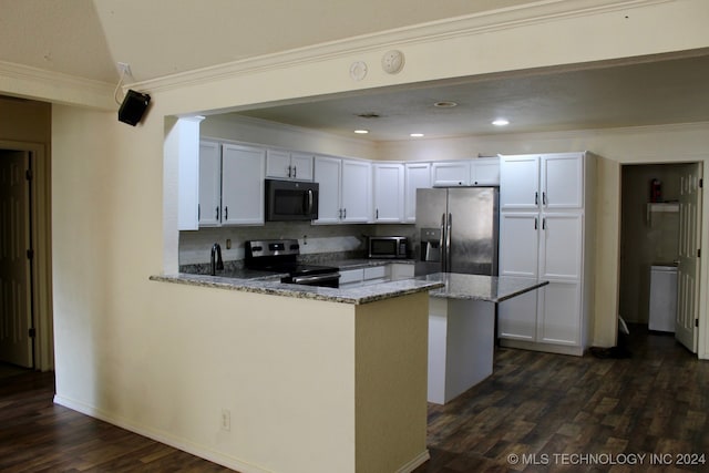 kitchen with white cabinetry, dark hardwood / wood-style flooring, appliances with stainless steel finishes, and stone countertops