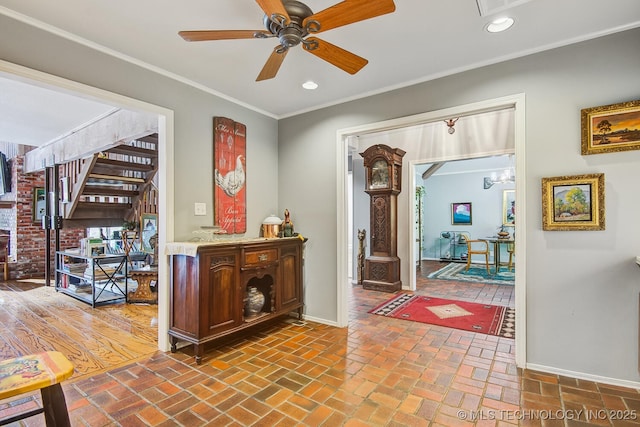 hall with baseboards, stairway, ornamental molding, recessed lighting, and brick floor