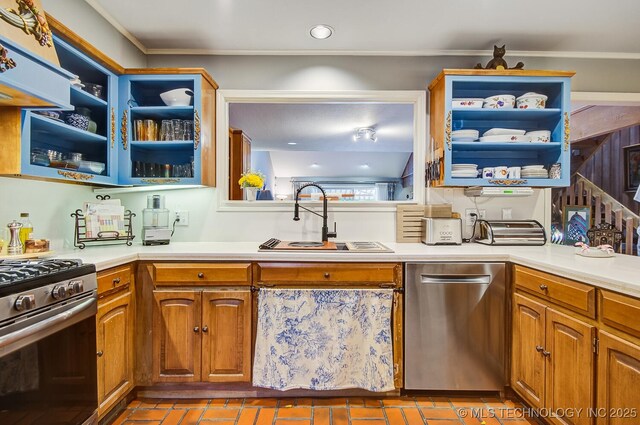 kitchen featuring custom exhaust hood, crown molding, appliances with stainless steel finishes, and sink