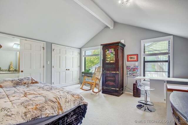 carpeted bedroom featuring access to outside and lofted ceiling with beams