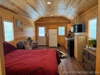 bedroom featuring light hardwood / wood-style flooring, vaulted ceiling, white fridge, and wooden ceiling