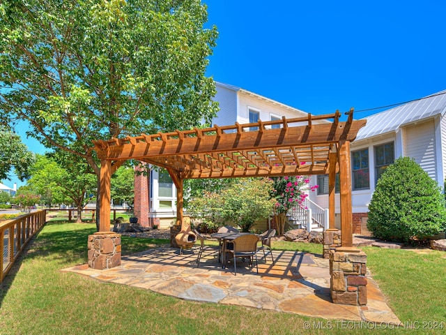 view of patio featuring a pergola