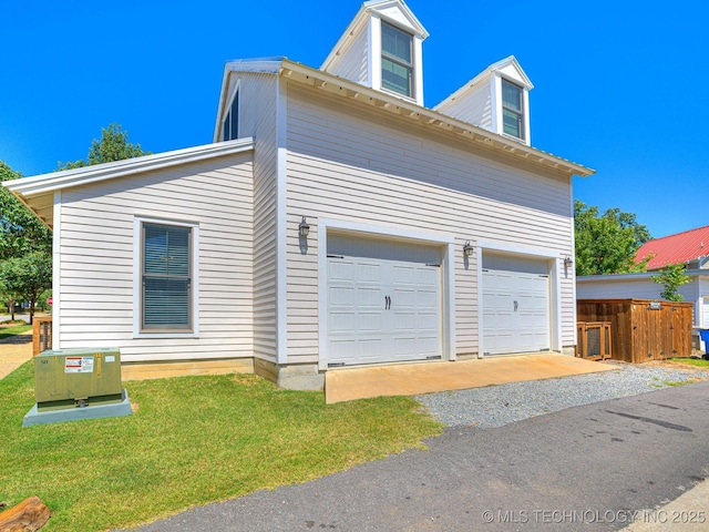 view of side of home featuring a yard