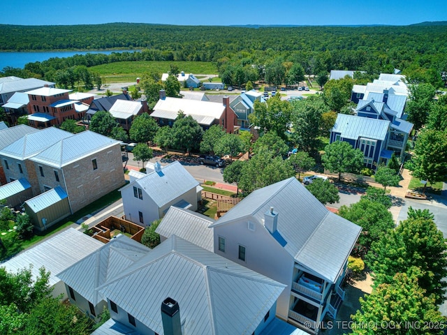 bird's eye view featuring a residential view and a view of trees