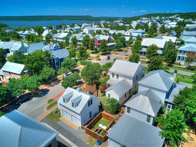 birds eye view of property with a residential view